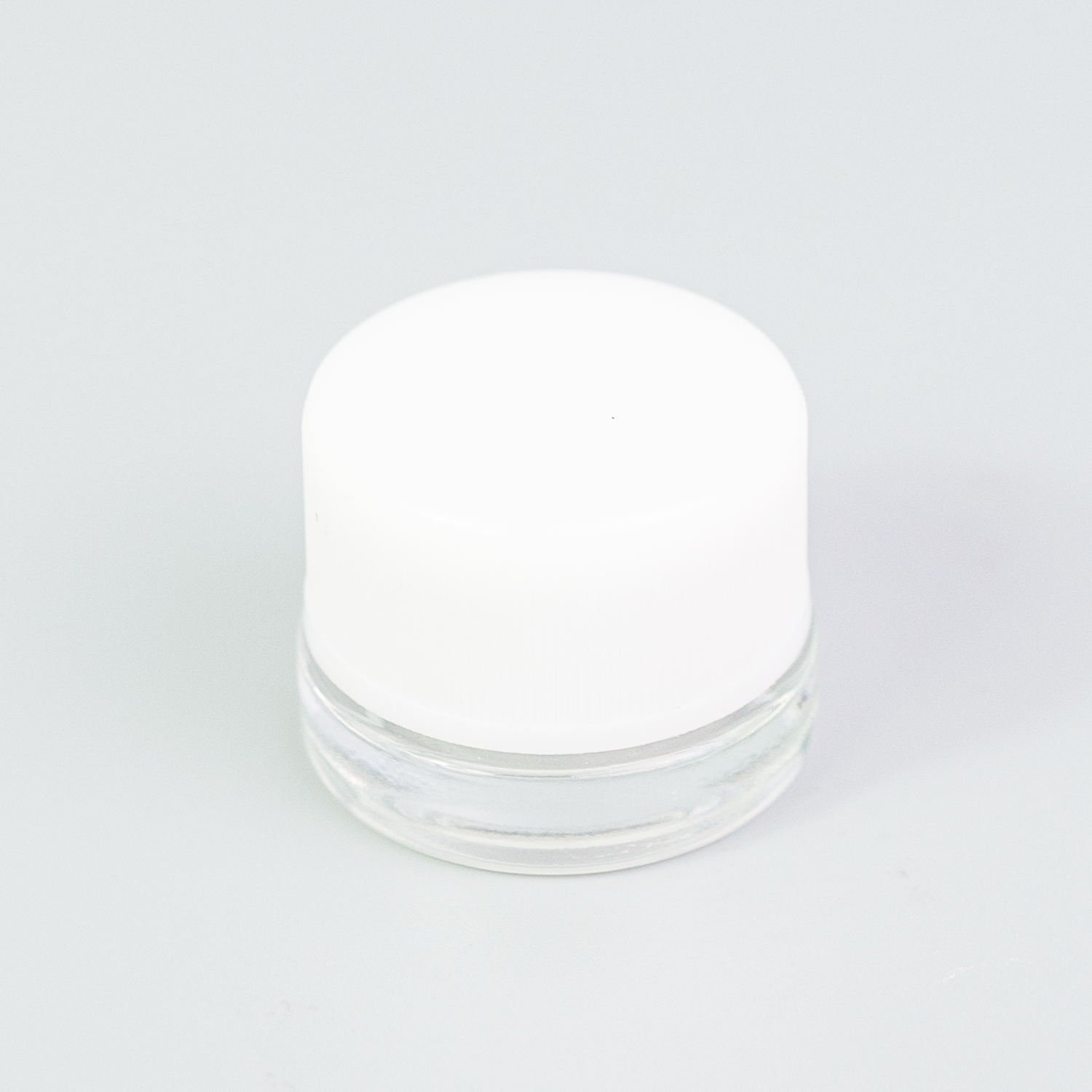 white cap concentrate glass jar